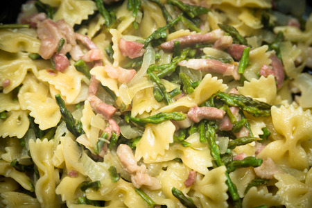 Farfalle with bacon and asparagus Italian Pastaの写真素材