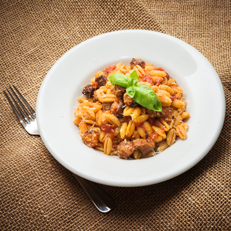Malloreddus Campidanese, Sardinian pasta with sausage and tomato sauceの写真素材
