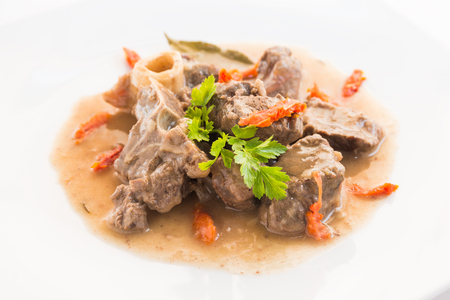 Dish of braised lamb with dried tomatoesの写真素材