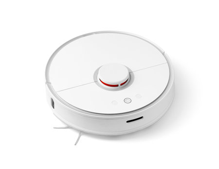 Modern autonomous smart robot vacuum cleaner. Self-propelled cleaning robot. floor cleaning system. Small appliances, home appliances.の写真素材