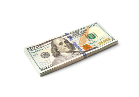 Stack of 100 dollar bills isolated on white background, one hundred dollar bills.の写真素材
