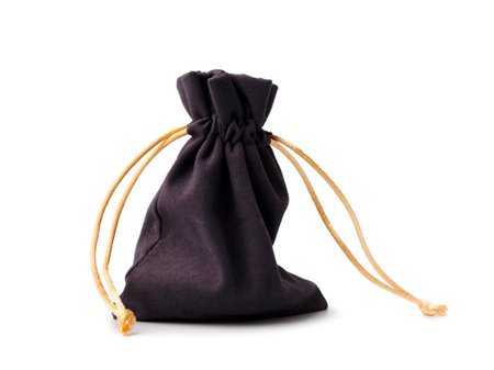 Soft velor fabric pouch with drawstring isolated on white background.の写真素材