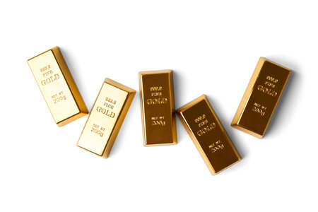 Gold bars isolated on white background, top view. The concept of finance, business, success, wealth,...