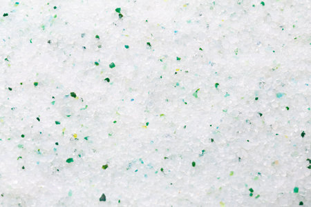 Silica gel white with green crystals for cat litter, close-up. Abstract background of pure silica gel crystals. Natural pet litter. animal care.の写真素材