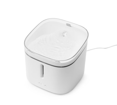 White electric pet water dispenser, smart cat drinker, drinking fountain with replaceable filter, water quantity and filter change indicators, isolated on white.の写真素材