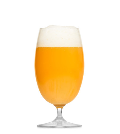 A glass of light beer with a beautiful foam, isolated on a white background, beer in a glass mug with a stem.の写真素材
