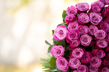 Huge bouquet of pink roses on a blurred background, copy space. Postcard, background, blank for design, template. Women's Day, Mother's Day, Valentine's Day. Flower delivery.の写真素材