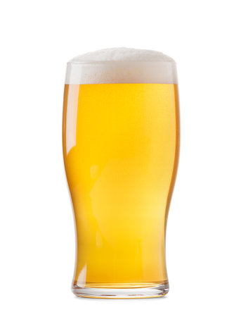 A glass of light beer with beautiful foam isolated on a white background, beer in a glass mug.の写真素材