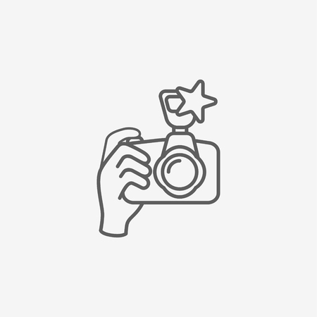 A digital camera on handのイラスト素材