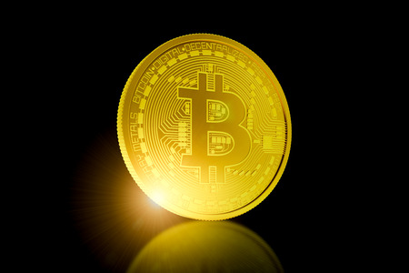 3d render of golden bitcoin on black background. Physical bit coin - Digital currency - Cryptocurrencyの写真素材