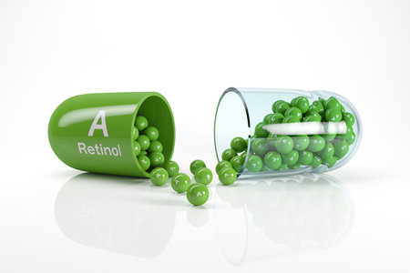 3d rendering of a vitamin capsule with vitamin A - retinol on white reflecting floor. - Dietary supplements.の写真素材