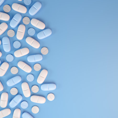 3d render of blue and white tablets, pills - medicine on blue background.の写真素材