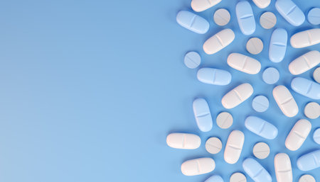 3d render of blue and white tablets, pills - medicine on blue background.の写真素材