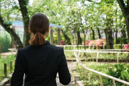 Young business woman working with a smileの写真素材