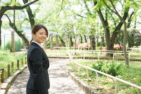 Young business woman working with a smileの写真素材