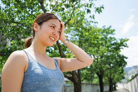 Young woman getting sweaty outdoorsの写真素材