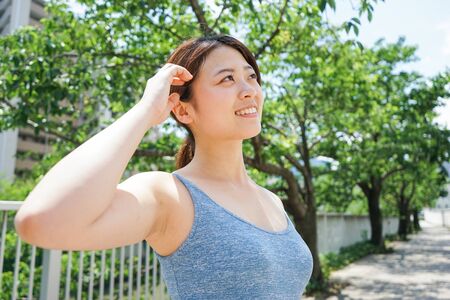 Young woman getting sweaty outdoorsの写真素材