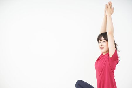 Young woman doing yogaの写真素材
