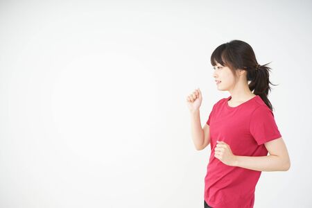 Running young womanの写真素材