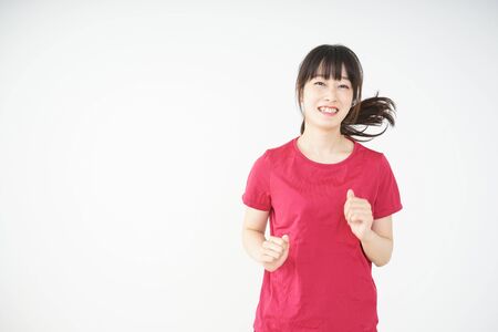 Running young womanの写真素材