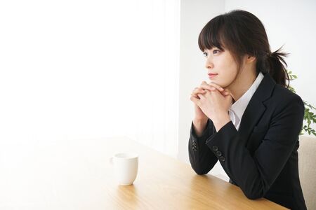 Business woman relaxing at cafeの写真素材