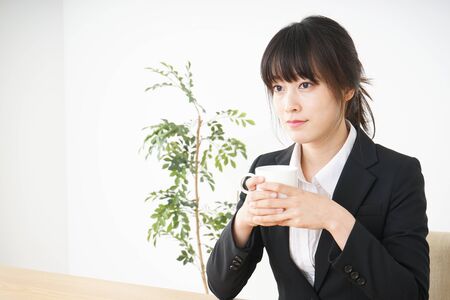 Business woman relaxing at cafeの写真素材