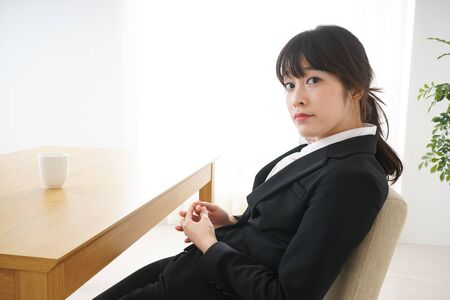 Business woman relaxing at cafeの写真素材