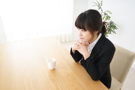 Business woman relaxing at cafeの写真素材
