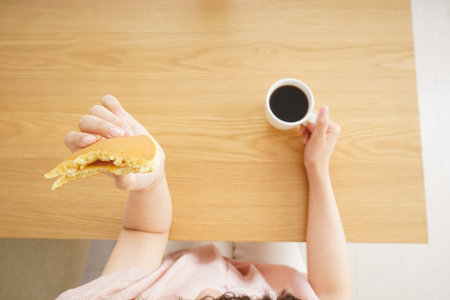 Young woman having a breakfast