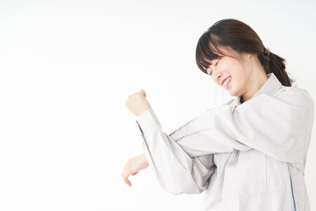 Woman working with uniformの写真素材