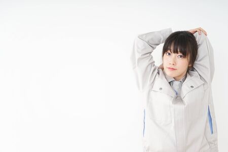 Woman working with uniformの写真素材