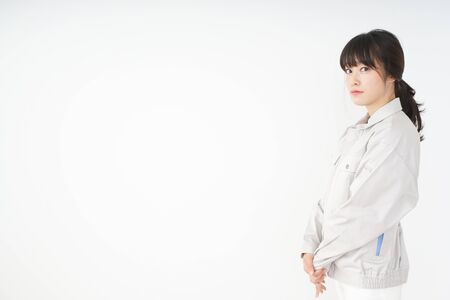 Woman working with uniformの写真素材