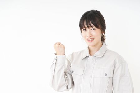 Woman working with uniformの写真素材