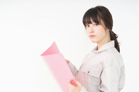 Woman working with uniformの写真素材