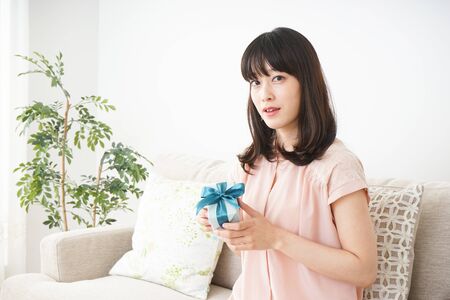 Young woman given a presentの写真素材