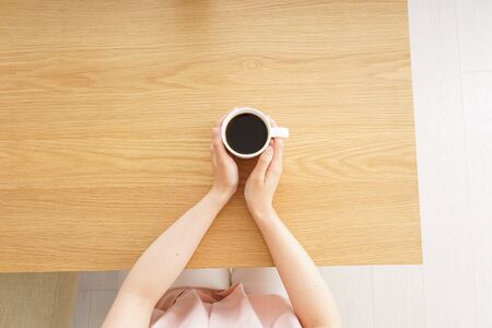 Young woman relaxed at cafeの写真素材