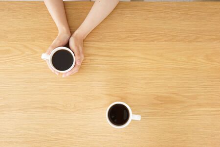 Young woman relaxed at cafeの写真素材