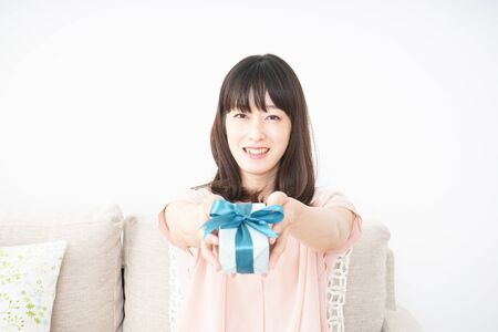 Young woman given a presentの写真素材