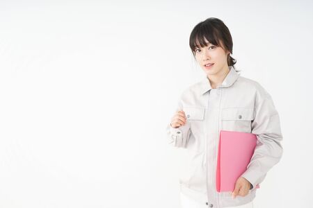 Woman working with uniformの写真素材