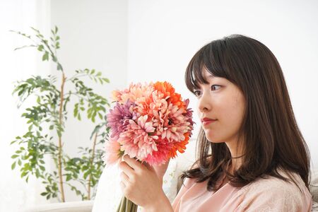 Young woman having a bouqueの写真素材