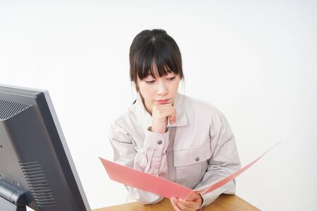 Woman working with uniformの写真素材