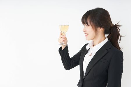 Woman drinking Alcoholics with suitの写真素材