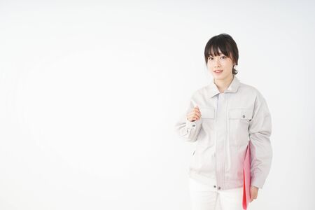 Woman working with uniformの写真素材