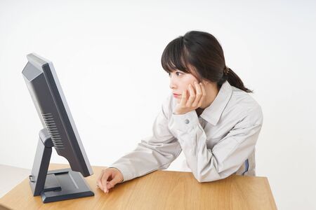 Woman working with uniformの写真素材