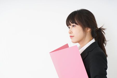 Young woman having some documents at officeの写真素材