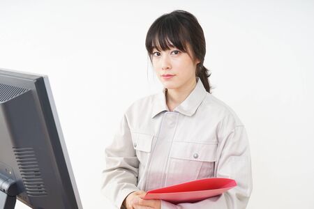 Woman working with uniformの写真素材
