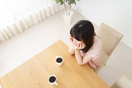 Young woman relaxed at cafeの写真素材