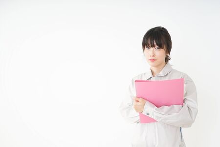 Woman working with uniformの写真素材