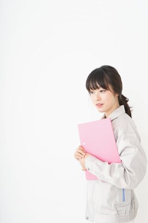 Woman working with uniformの写真素材
