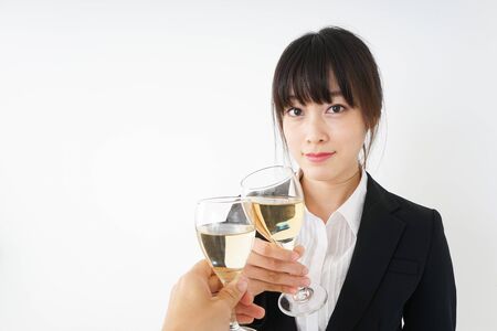Woman drinking Alcoholics with suitの写真素材